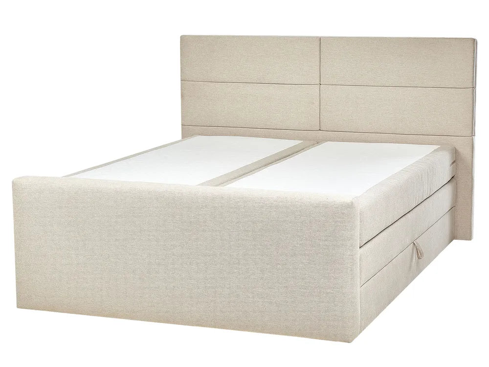 Beige upholstered bed with a headboard on a white background