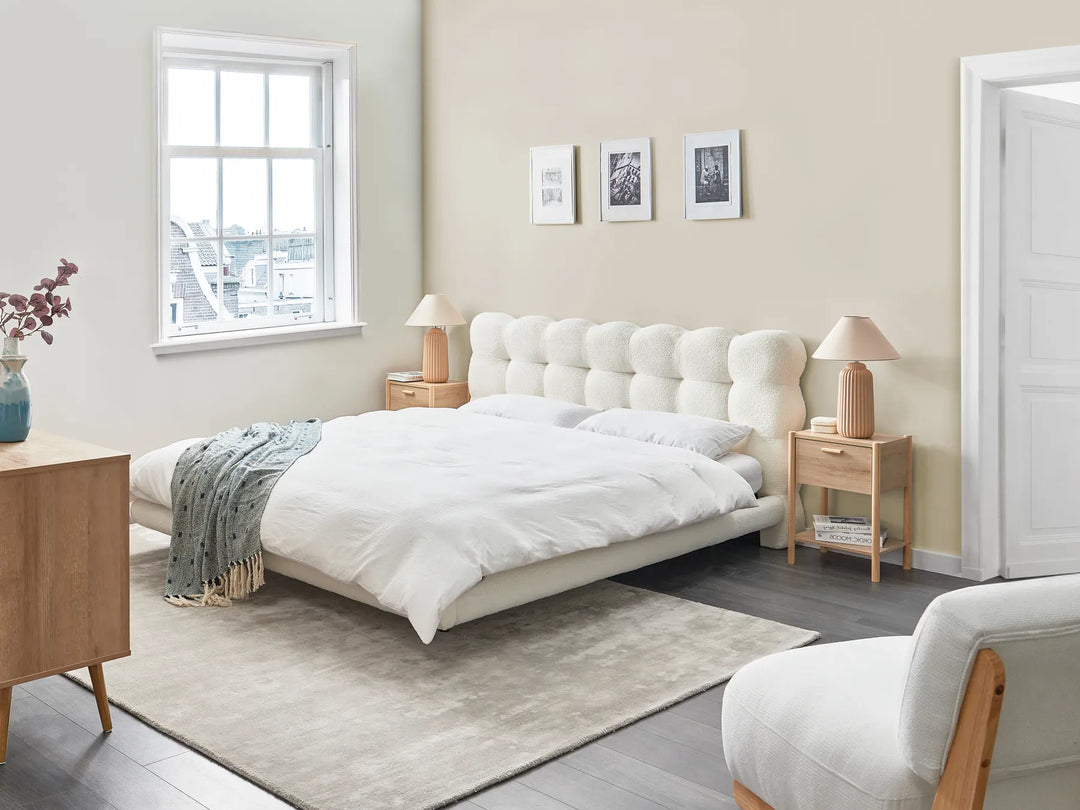 Tufted boucle bed with padded headboard