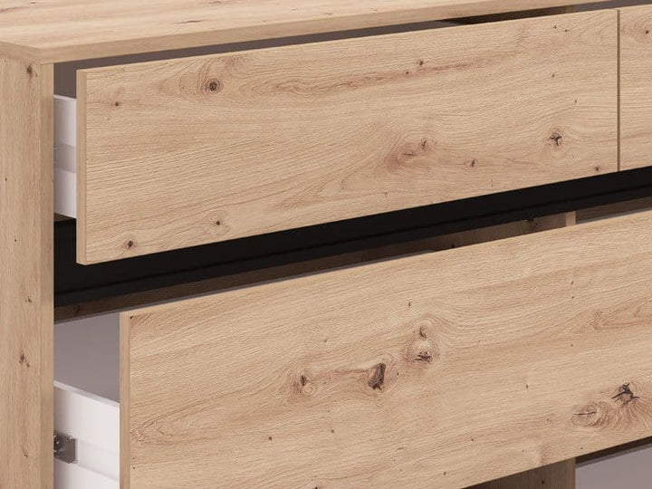Wooden drawer with black trim on a piece of furniture