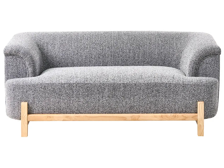 Gray sofa with wooden legs on a white background