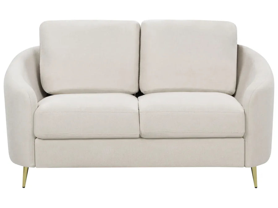 Beige sofa with gold legs on a white background