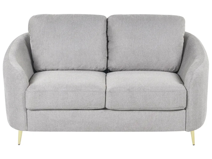 Gray sofa with gold legs on a white background