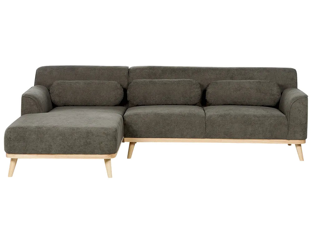 Gray sectional sofa with wooden legs on a white background