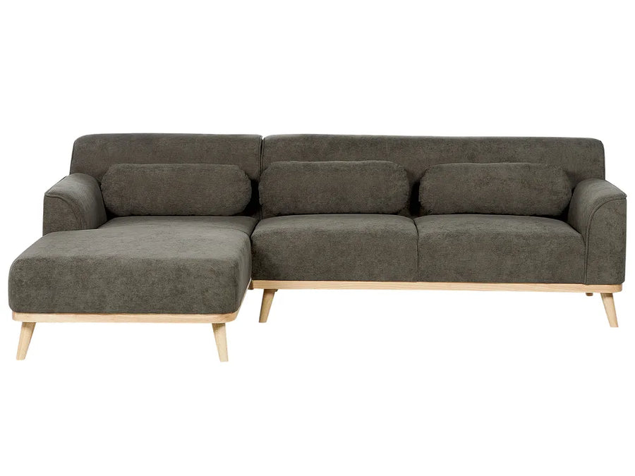 Gray sectional sofa with wooden legs on a white background