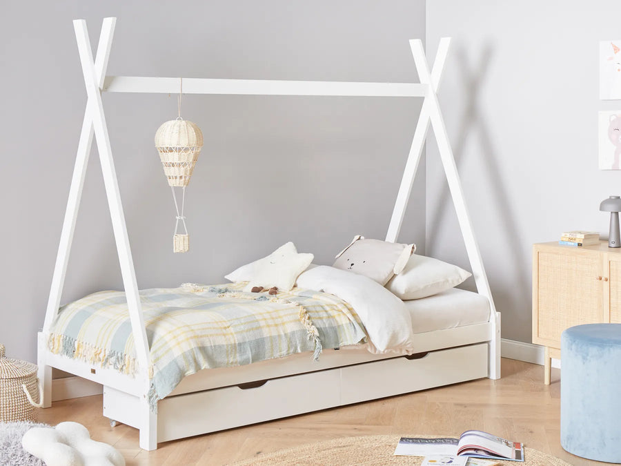 White teepee-style bed with bedding in a room setting