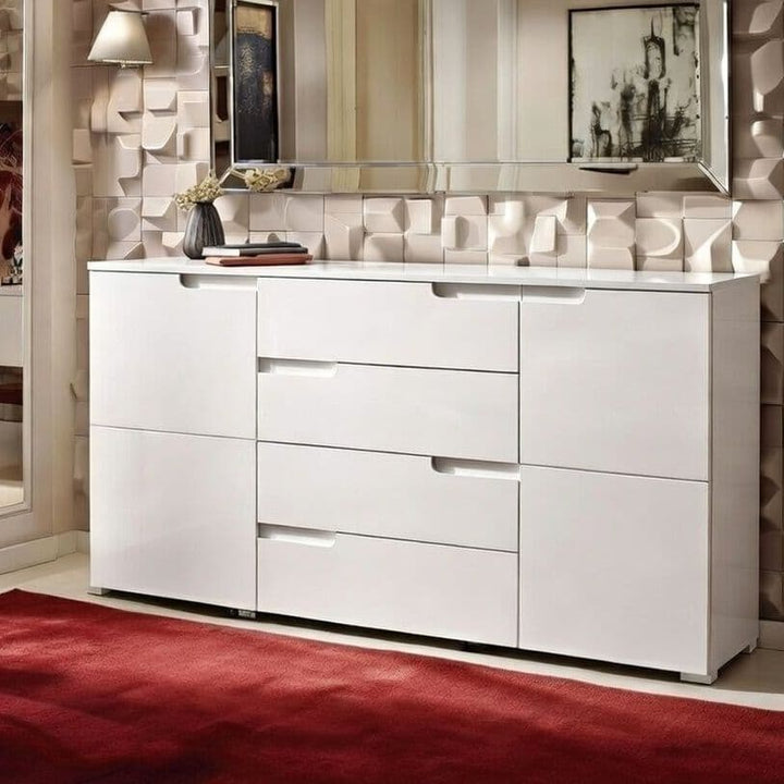 White dresser with multiple drawers in a room with geometric wall design