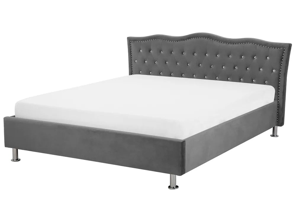 Dark grey velvet ottoman bed with tufted headboard