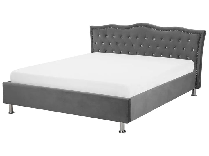 Dark grey velvet ottoman bed with tufted headboard