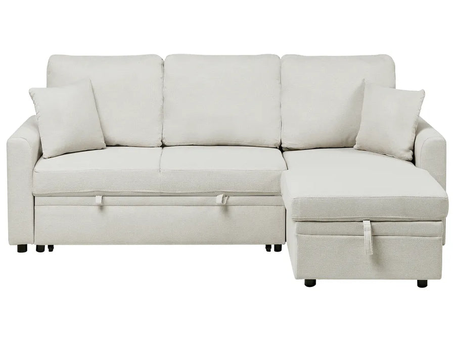 Beige sectional sofa with storage on a white background