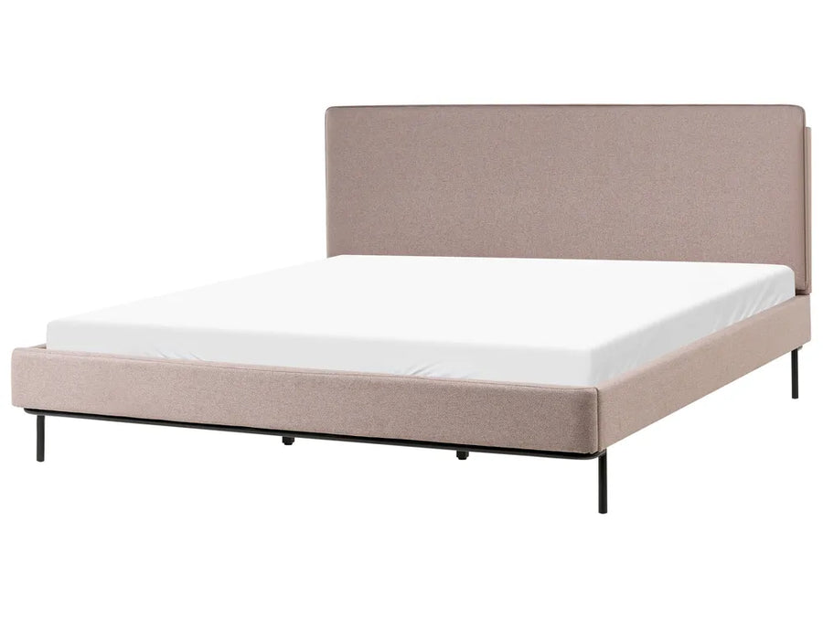Beige upholstered bed frame with white mattress on a white background