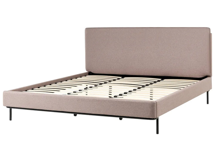 Beige upholstered bed frame with metal slats on a white background