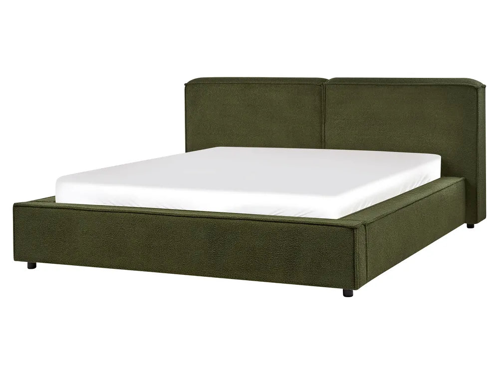 Green upholstered bed with white mattress on a white background