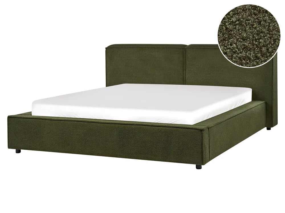 Green upholstered bed with white mattress on a white background