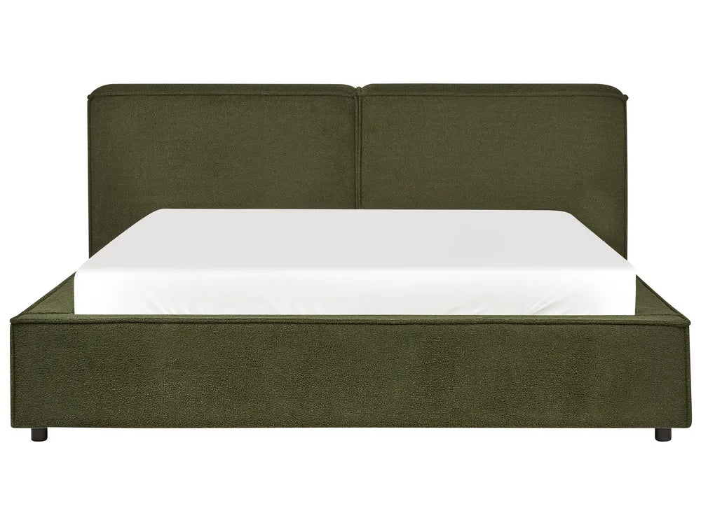Green upholstered bed with white mattress on a white background