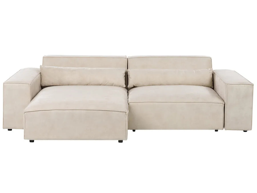 Beige sectional sofa on a white background