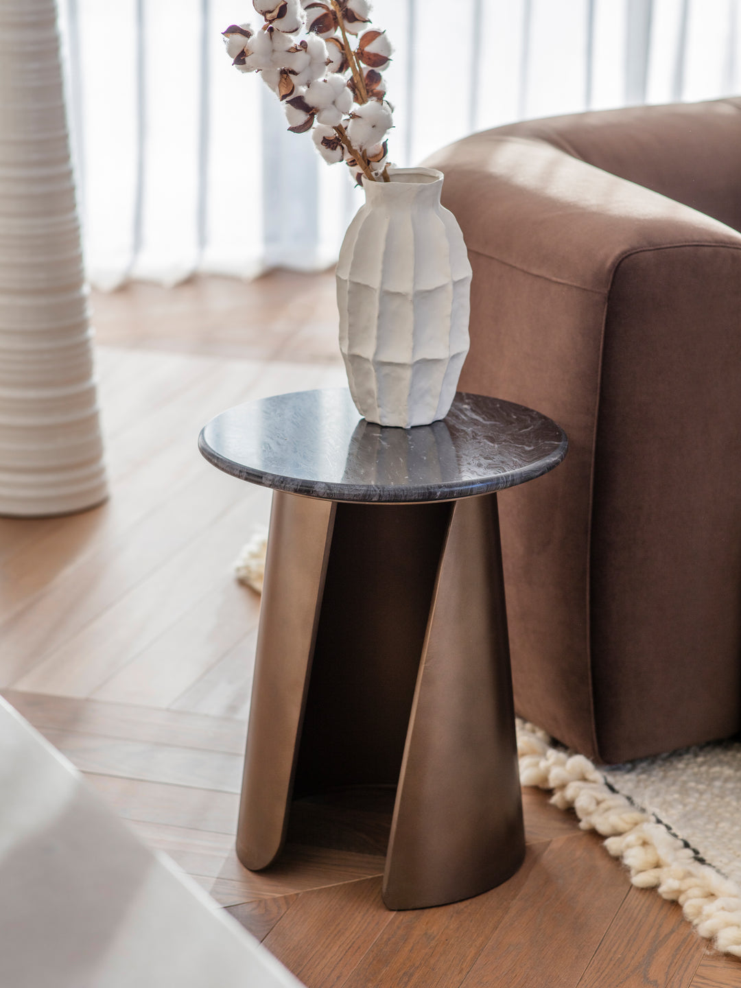 Modern crescent side table with marble top and gold frame