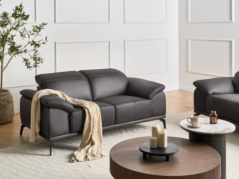 Black faux leather 2 seater sofa with adjustable headrest