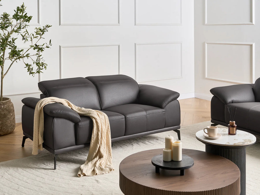 Black faux leather 2 seater sofa with adjustable headrest
