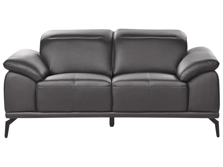Gray leather sofa on a white background