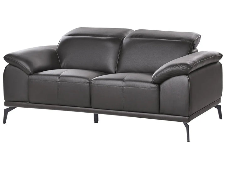 Black leather sofa on a white background