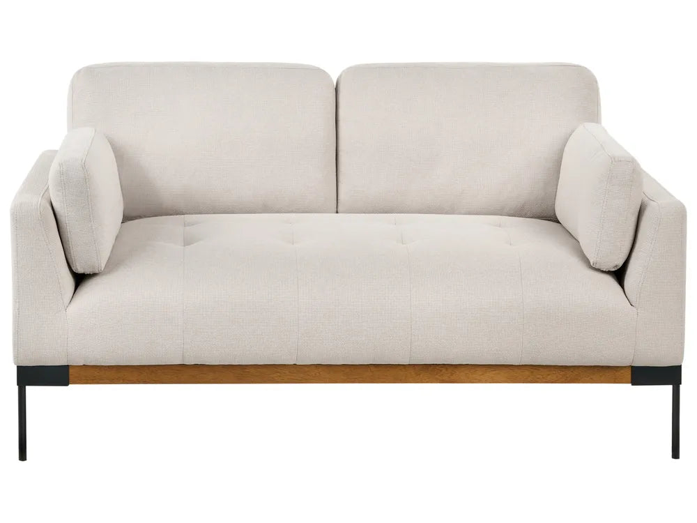 Beige sofa with wooden legs on a white background