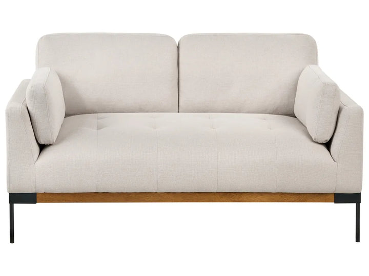 Beige sofa with wooden legs on a white background