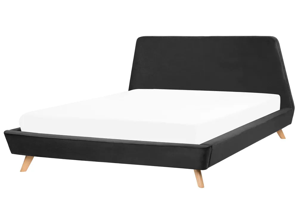 Black bed frame with white mattress on a white background