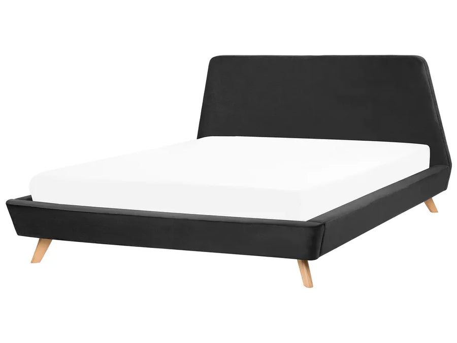 Black bed frame with white mattress on a white background