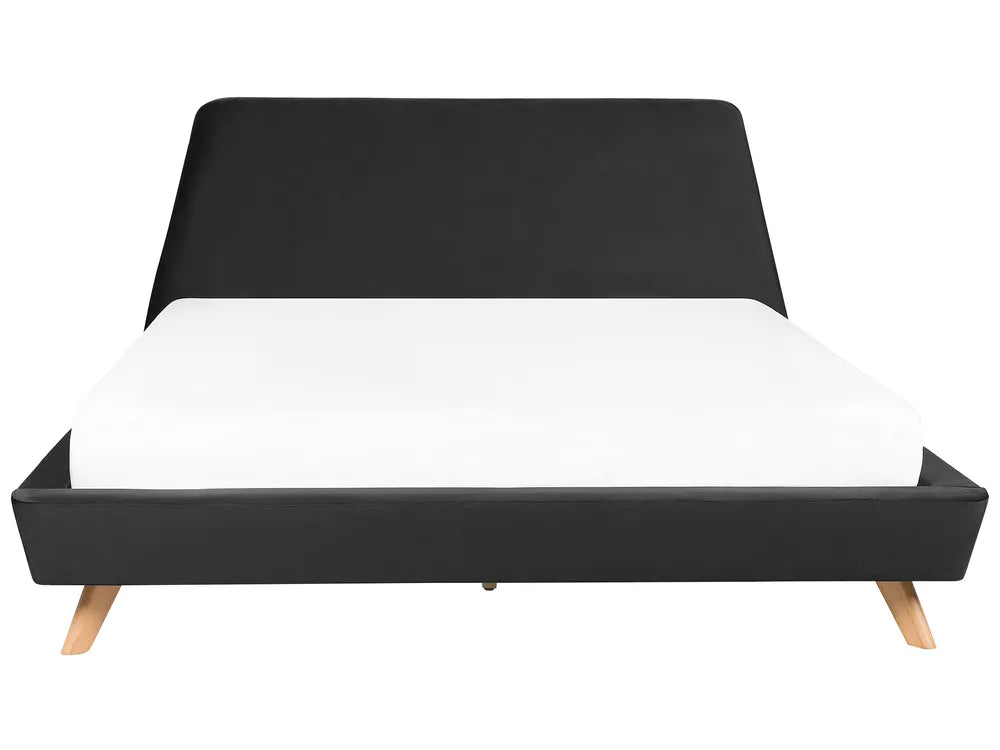Black bed frame with white mattress on a white background