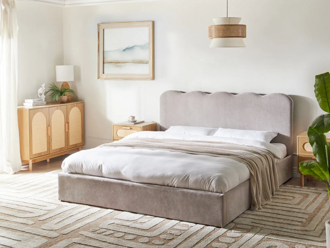 Modern ottoman bed with upholstered taupe fabric frame