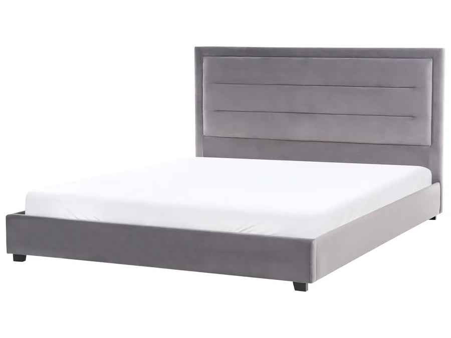 Gray upholstered bed with white mattress on a white background