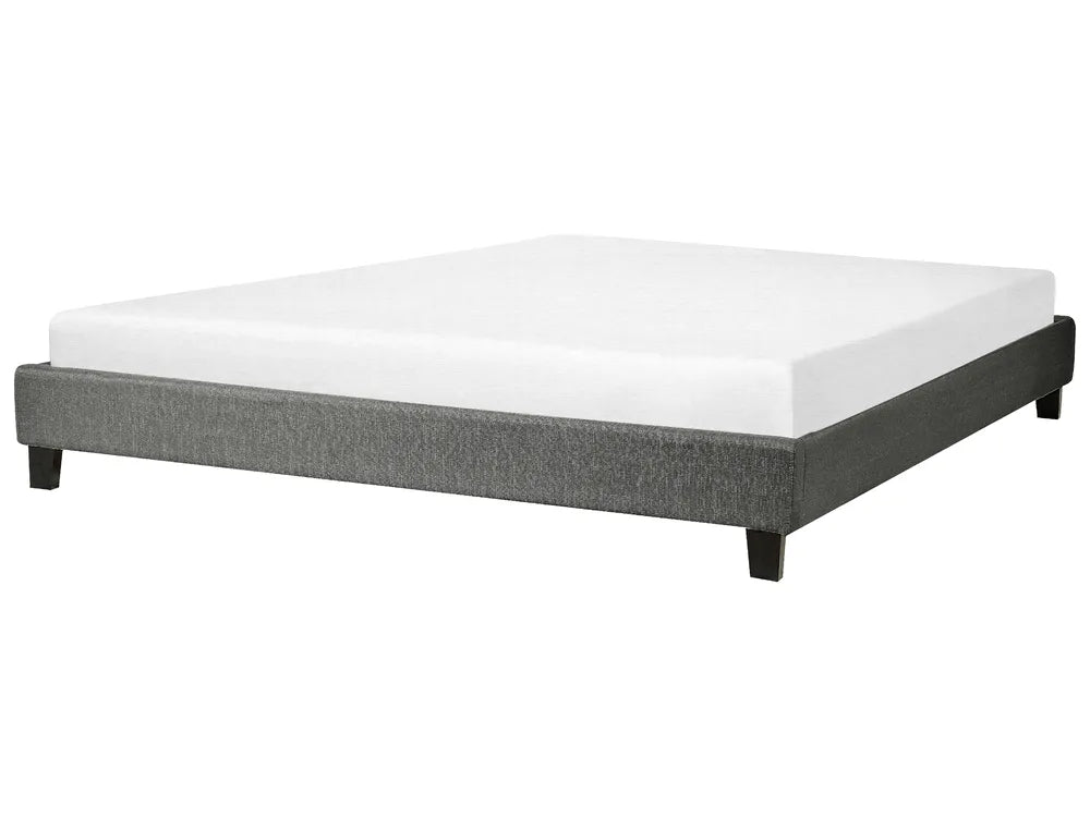 Bed with gray frame and white mattress on a white background