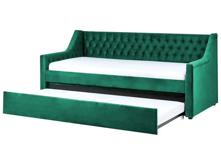 Green velvet sofa bed with white mattress on a white background