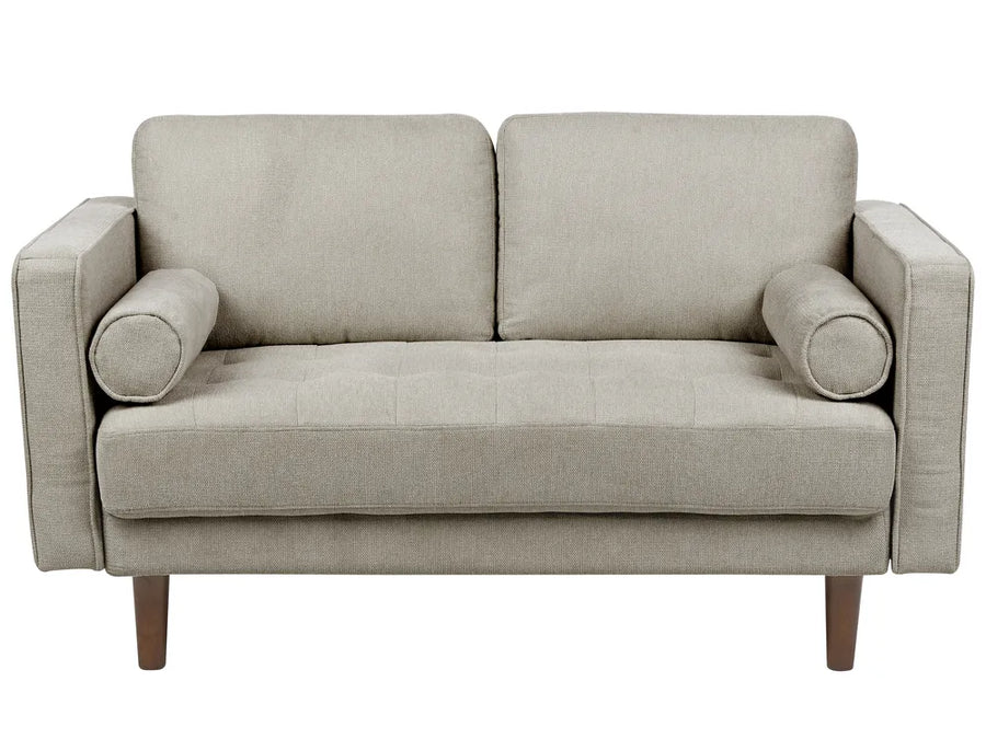 Beige sofa with wooden legs on a white background