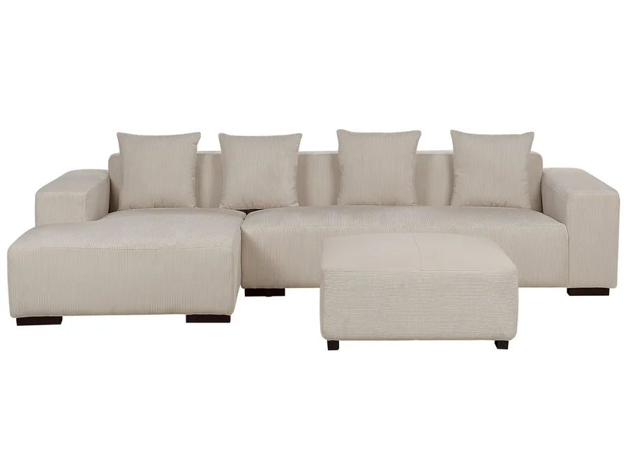 Beige sectional sofa with ottoman on a white background
