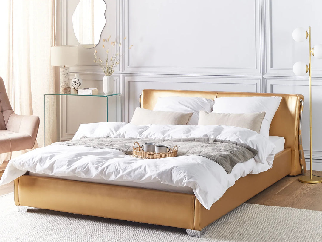 Upholstered leather waterbed in gold finish