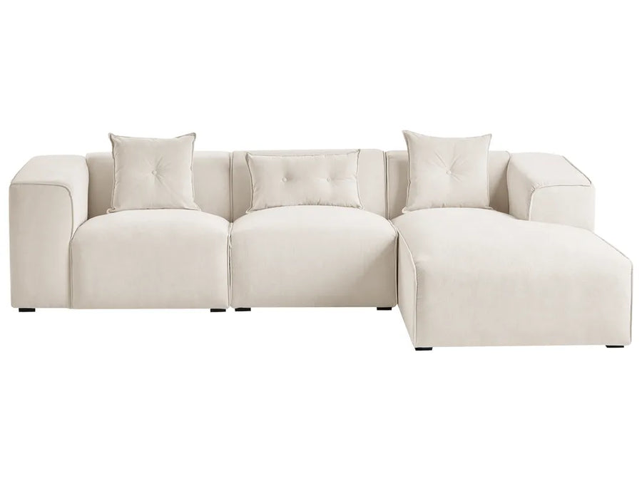 Beige sectional sofa on a white background