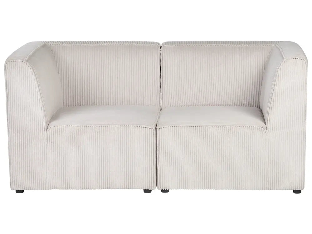 Light gray sofa with a subtle pattern on a white background