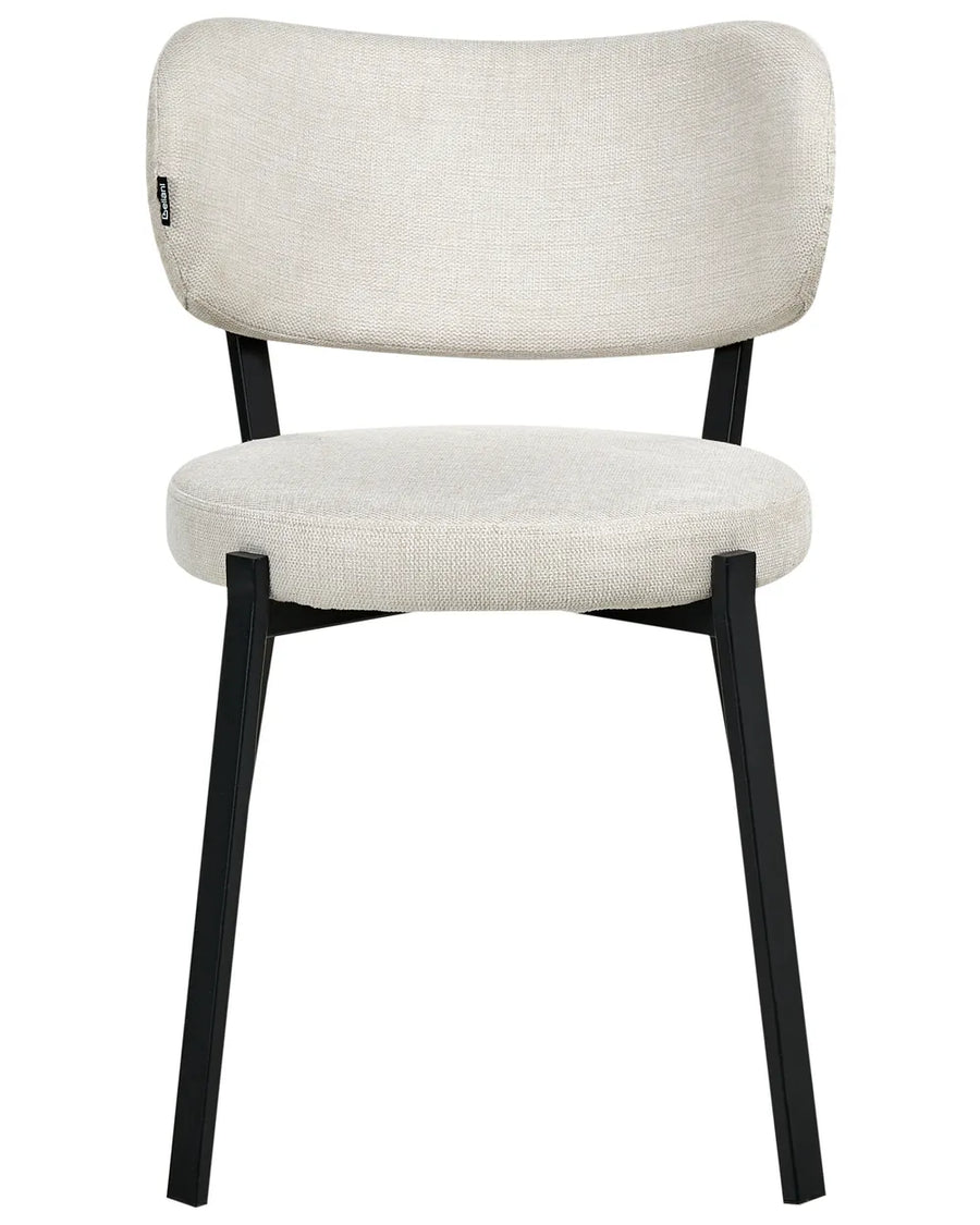 Modern upholstered dining chair in light cream fabric with a curved backrest, cushioned seat, and sleek black metal legs.