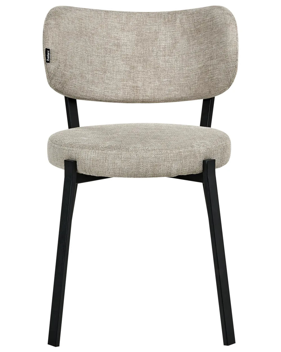 Upholstered dining chair in light beige fabric with a curved backrest, padded seat, and sturdy black metal frame.