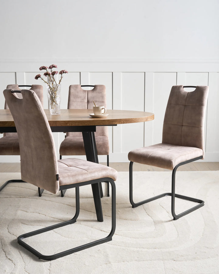 Elegant dining chairs in a warm taupe finish, combining comfort and modern design to create a sophisticated dining setting.