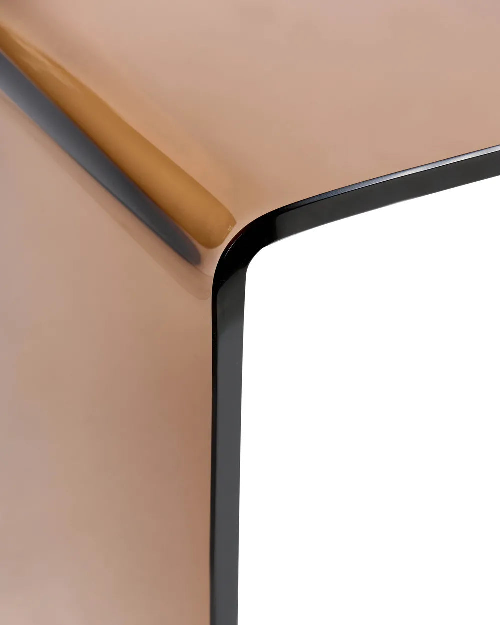 Close-up of a beige chair with a black armrest on a white background