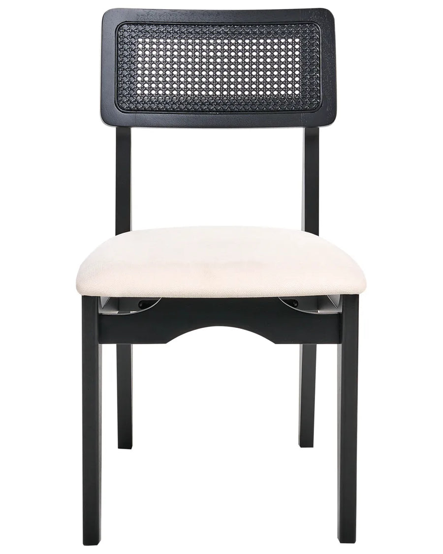 Black dining chair with a woven cane backrest and soft upholstered seat, blending clean modern lines with timeless texture for a sophisticated and contemporary look.