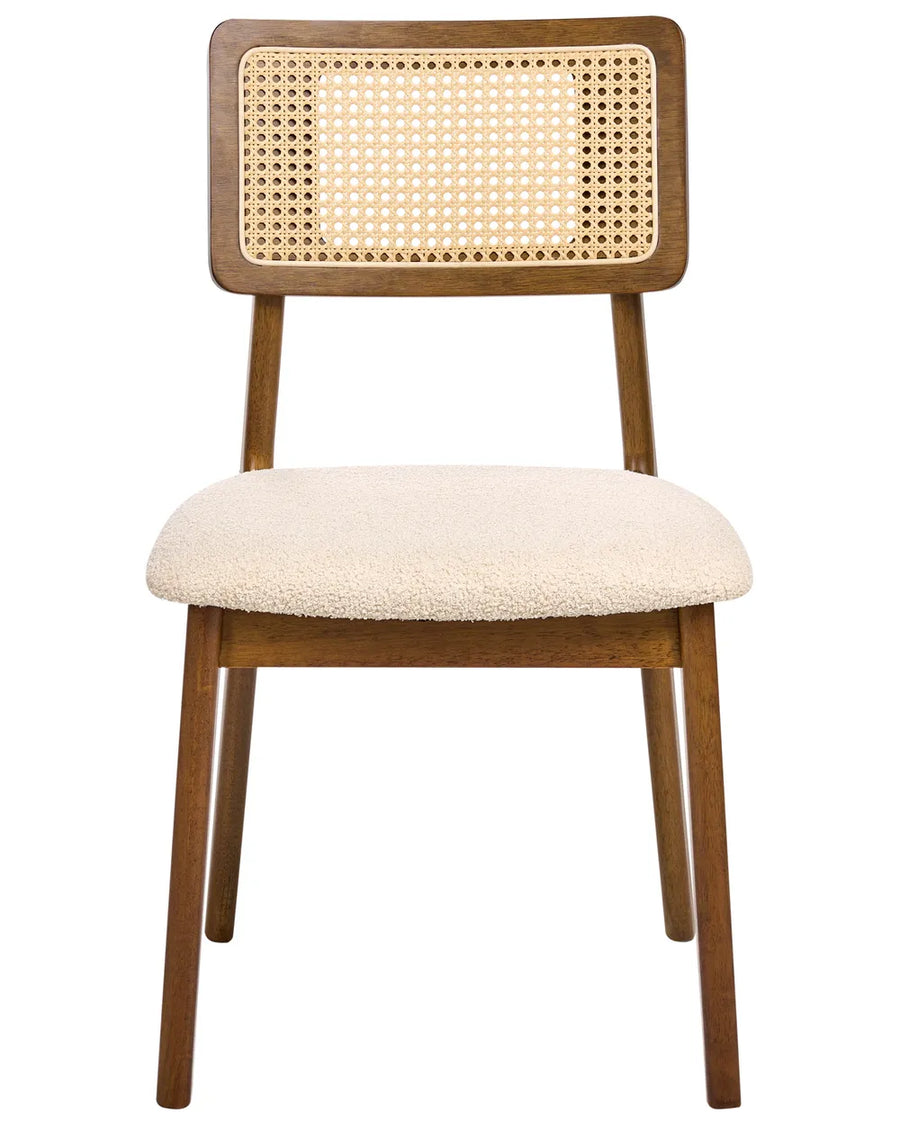 Stylish dining chair crafted from solid wood in a rich walnut finish, featuring a woven rattan cane backrest and a generously padded boucle-upholstered seat. The combination of warm wood tones, natural cane detailing, and soft textured fabric creates an inviting balance of comfort and sophistication, ideal for modern, mid-century, and contemporary interiors.