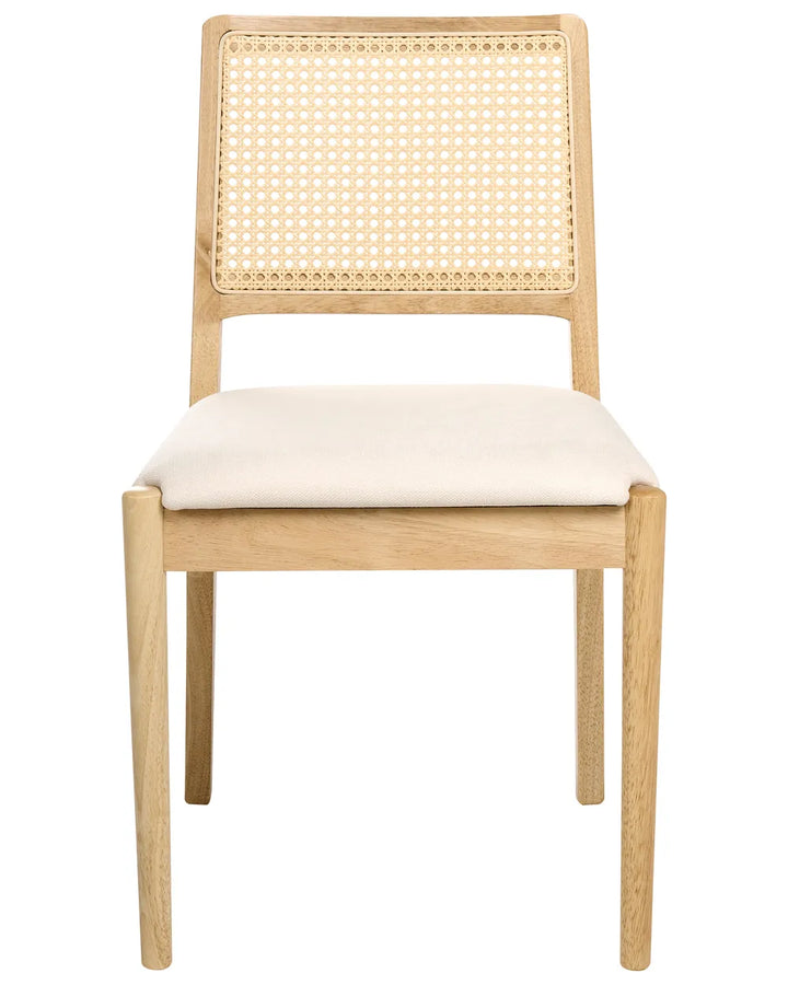 Light wood dining chair featuring a woven cane backrest and soft upholstered seat, blending natural textures with clean lines for a timeless Scandinavian and coastal-inspired look.