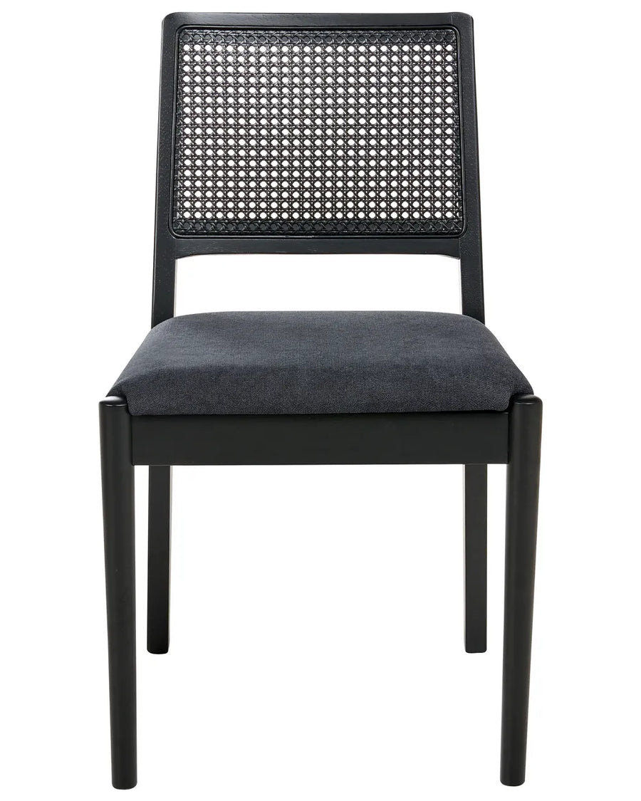 Black dining chair with a woven cane backrest and plush upholstered seat, combining sleek modern lines with timeless natural texture for an elegant, contemporary look.