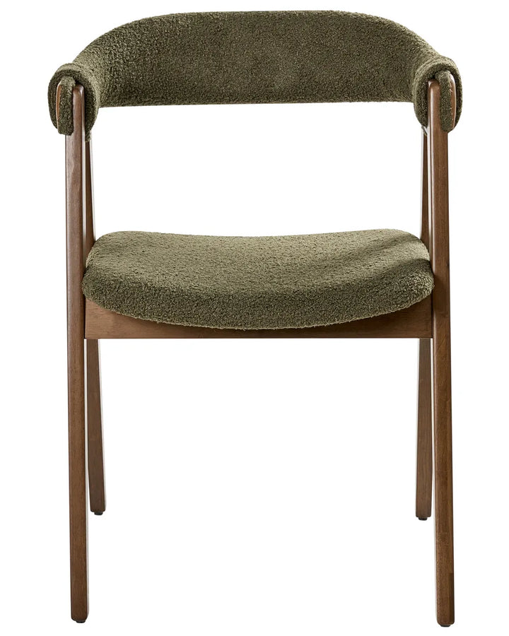 Olive green bouclé dining chair with a curved wraparound backrest, padded seat, and rich walnut-finish wooden frame.