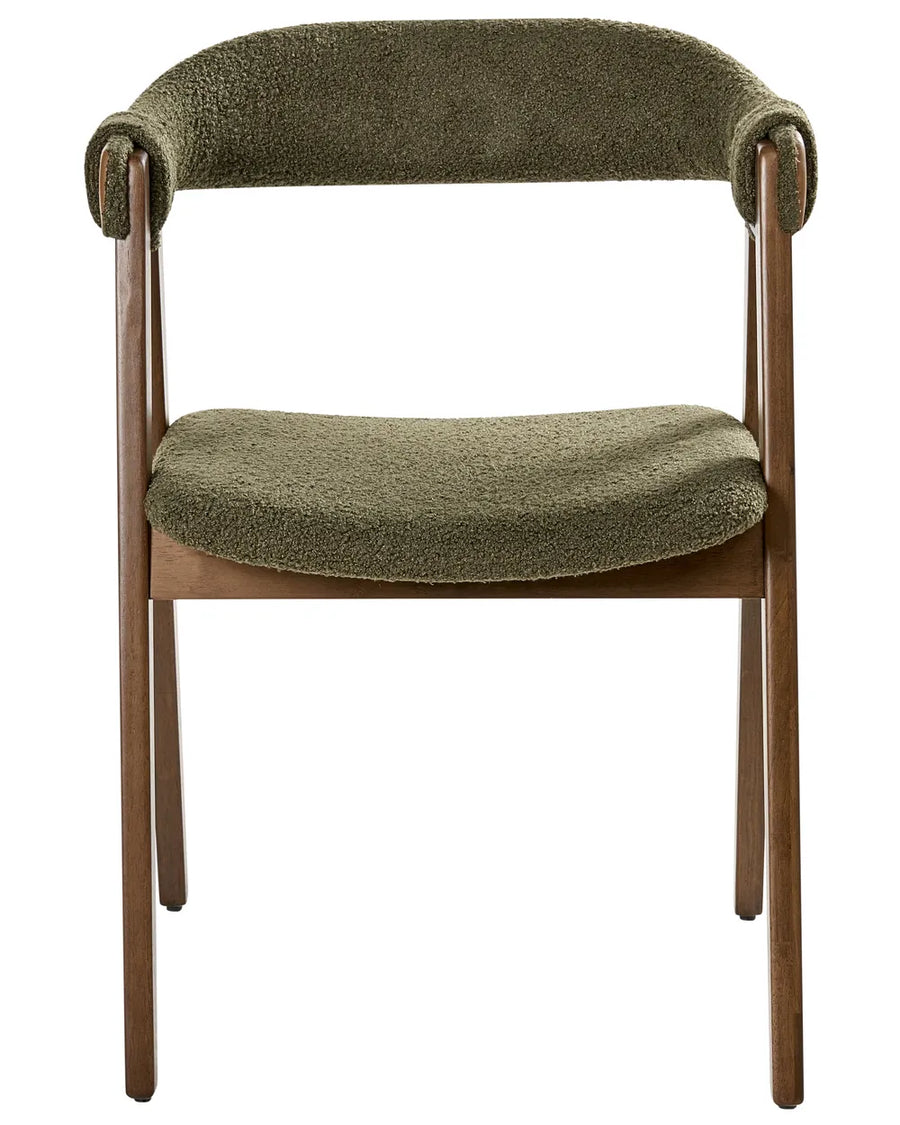 Olive green bouclé dining chair with a curved wraparound backrest, padded seat, and rich walnut-finish wooden frame.