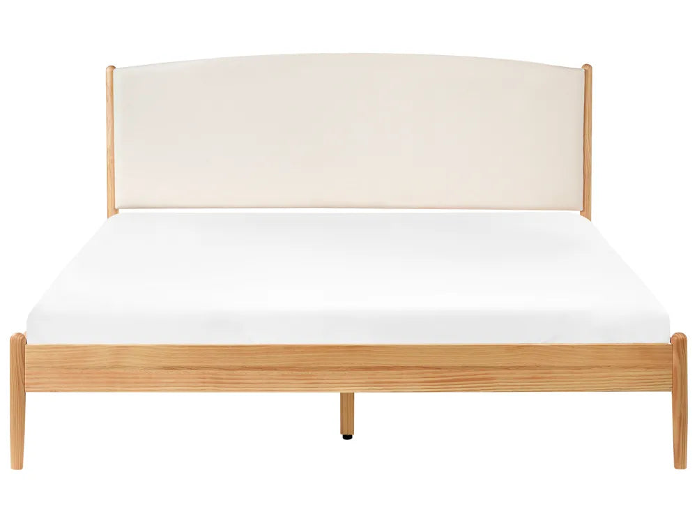 Wooden bed frame with white mattress on a white background