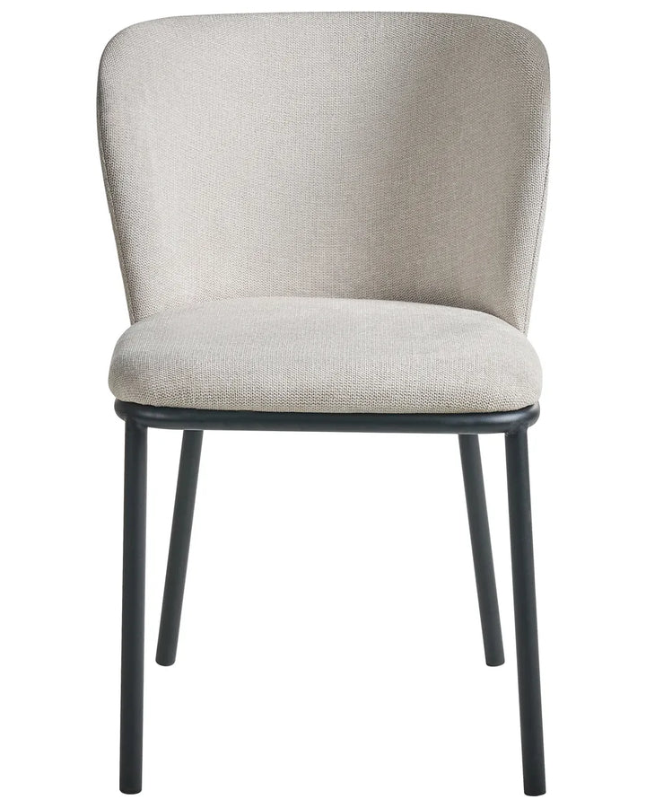 Light-beige upholstered dining chair with a curved backrest, padded seat, and black metal legs for a sleek modern look.
